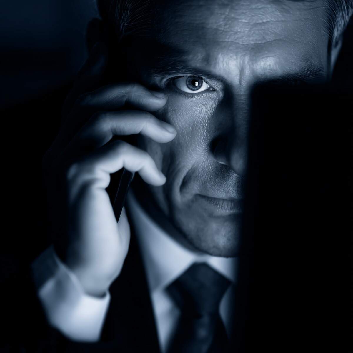 Soulchill blackmail expert help - menacing figure making threatening phone call representing sophisticated social media blackmail requiring professional intervention